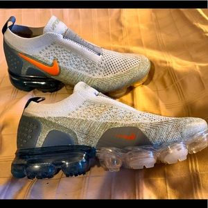 Nike blue, gray and orange slip on tennis shoe. Size 6